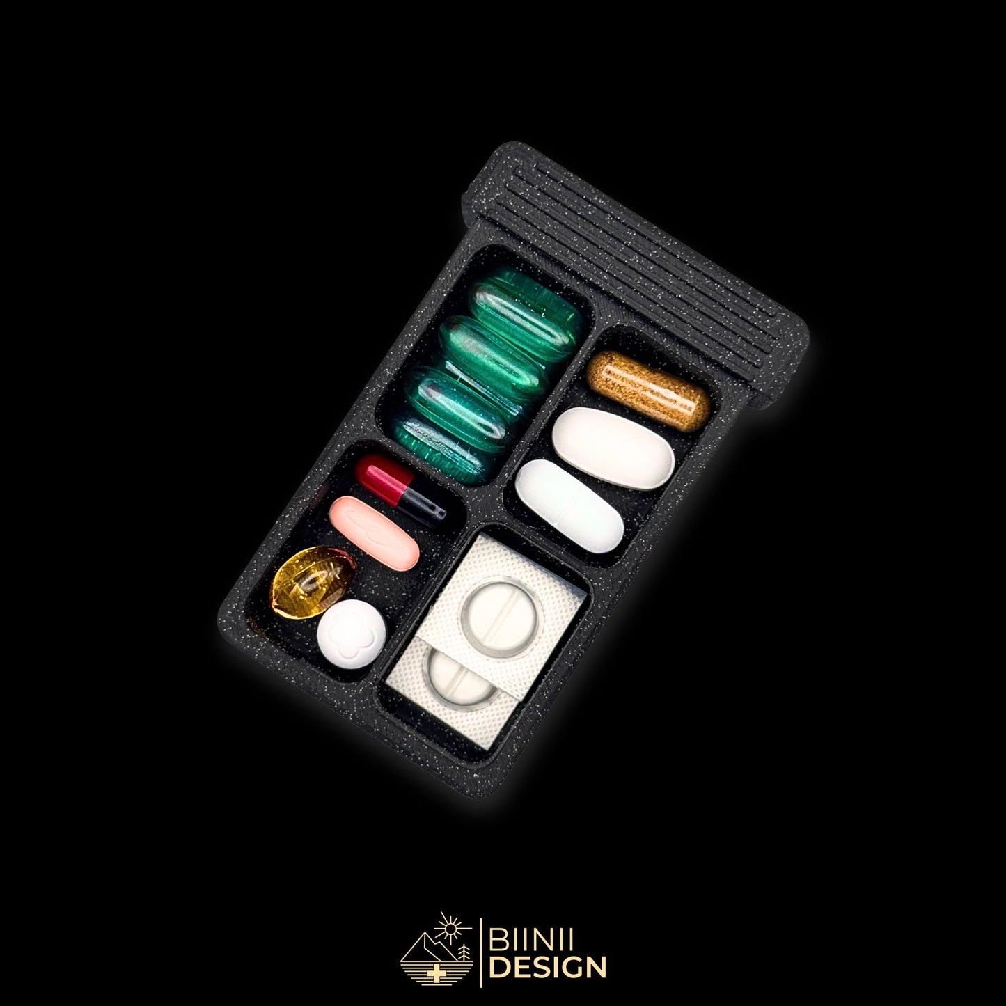 4-compartment artistic pillbox in galaxy black, compact design for pills, supplements, or daily vitamins.