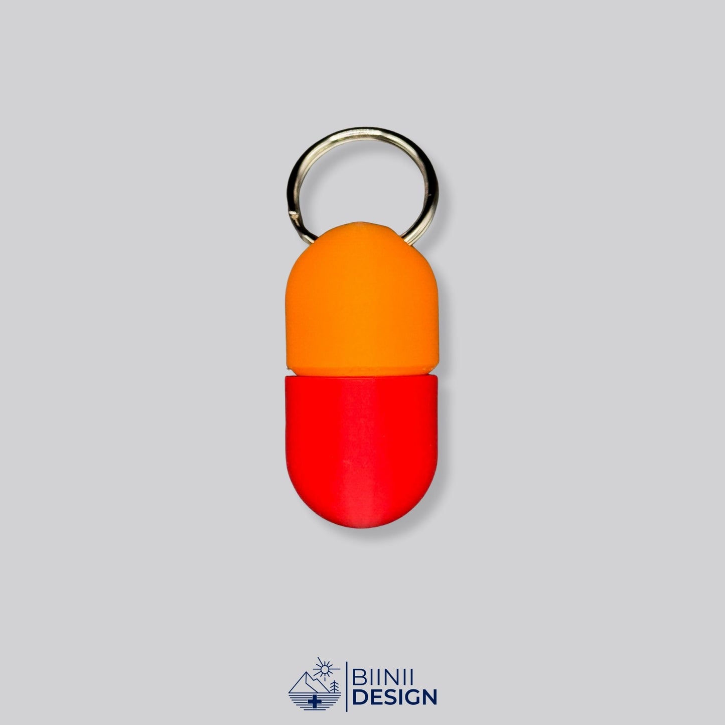 Orange and red travel pillbox with capsule design. Practical and vibrant solution for carrying small pills or vitamins anywhere.
Keywords: red-orange pill container, travel pill case, compact organizer