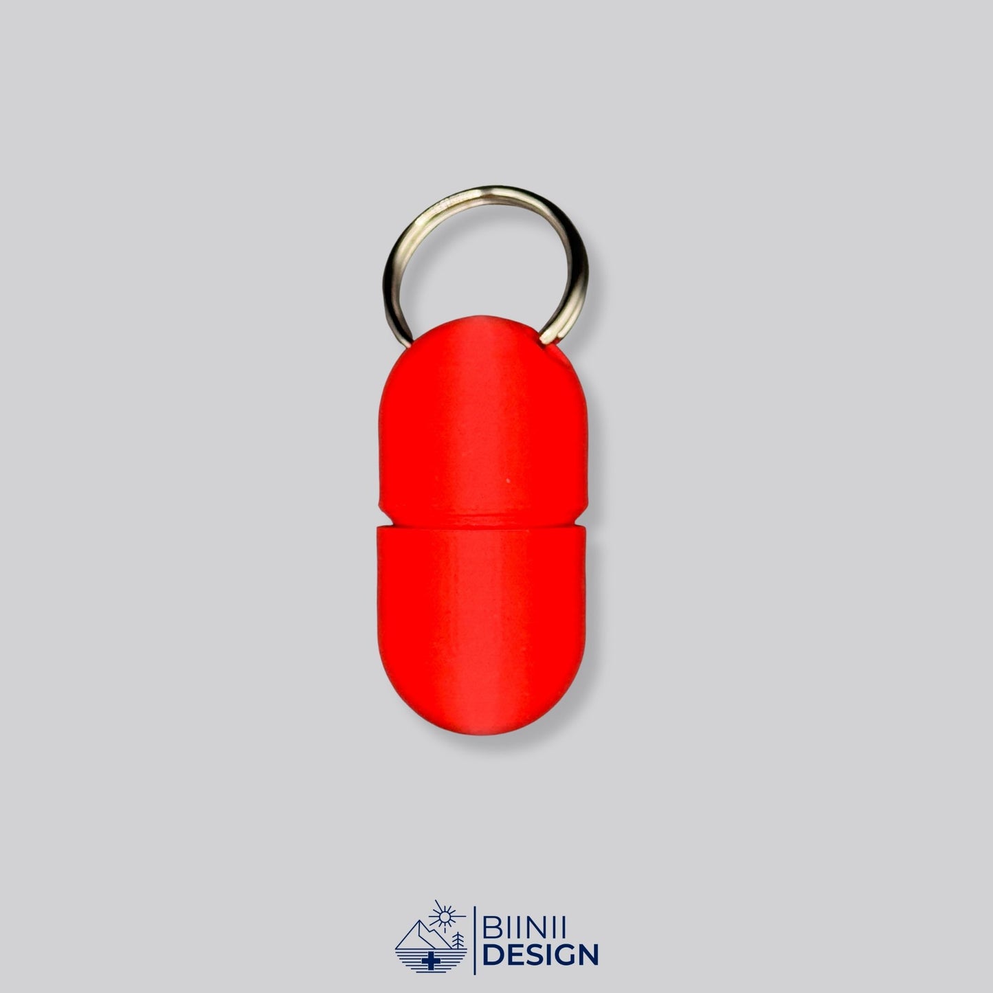Monochrome red pillbox with screw-top and keychain. A compact and vibrant solution for organizing daily pills or Lactaid.
Keywords: red pill holder, compact capsule case, keychain supplement box