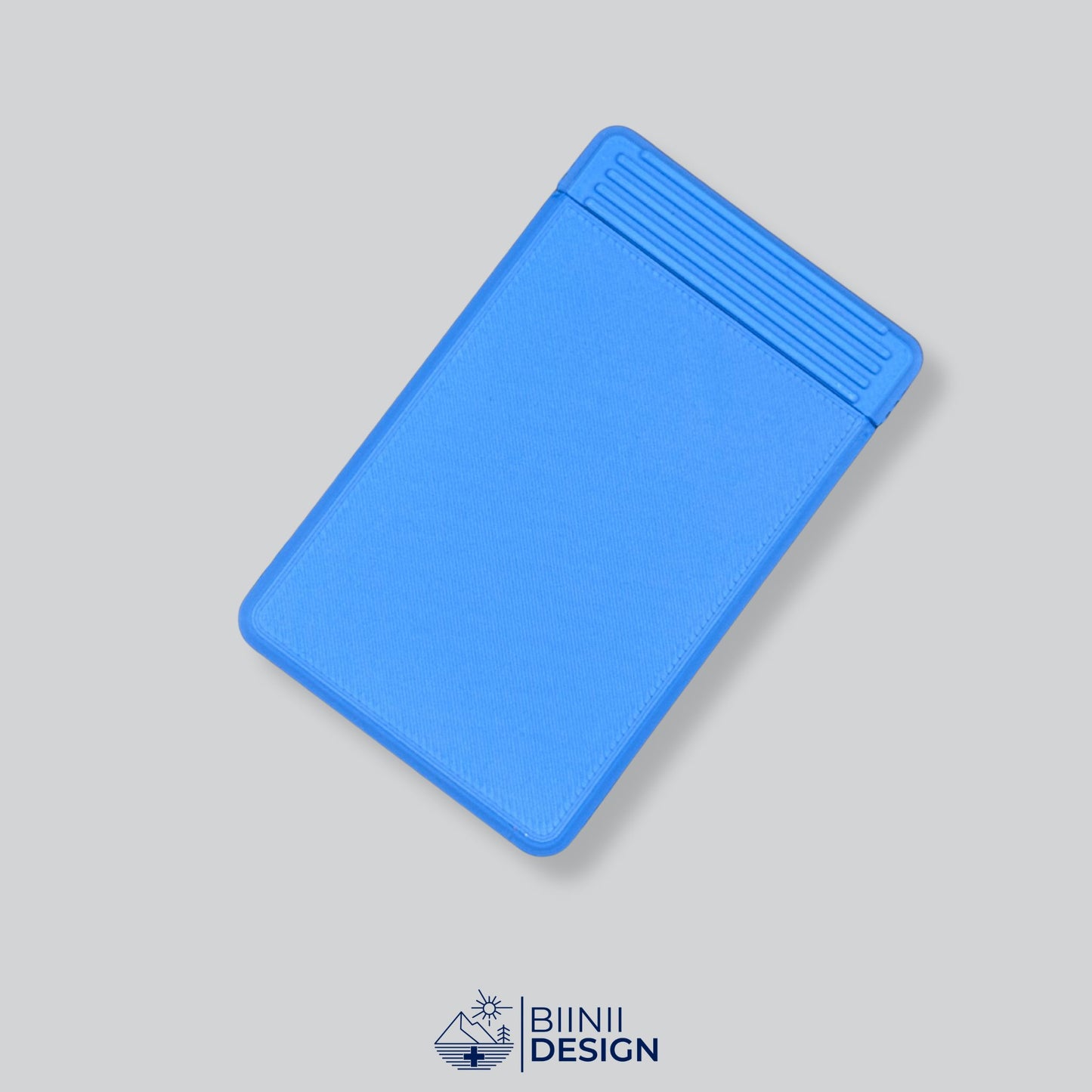 The elegant Blue monochrome minimalist precision-crafted travel pill organizer, perfect for blister-cut tablets, a precision Swiss-made Biinii Design piece.