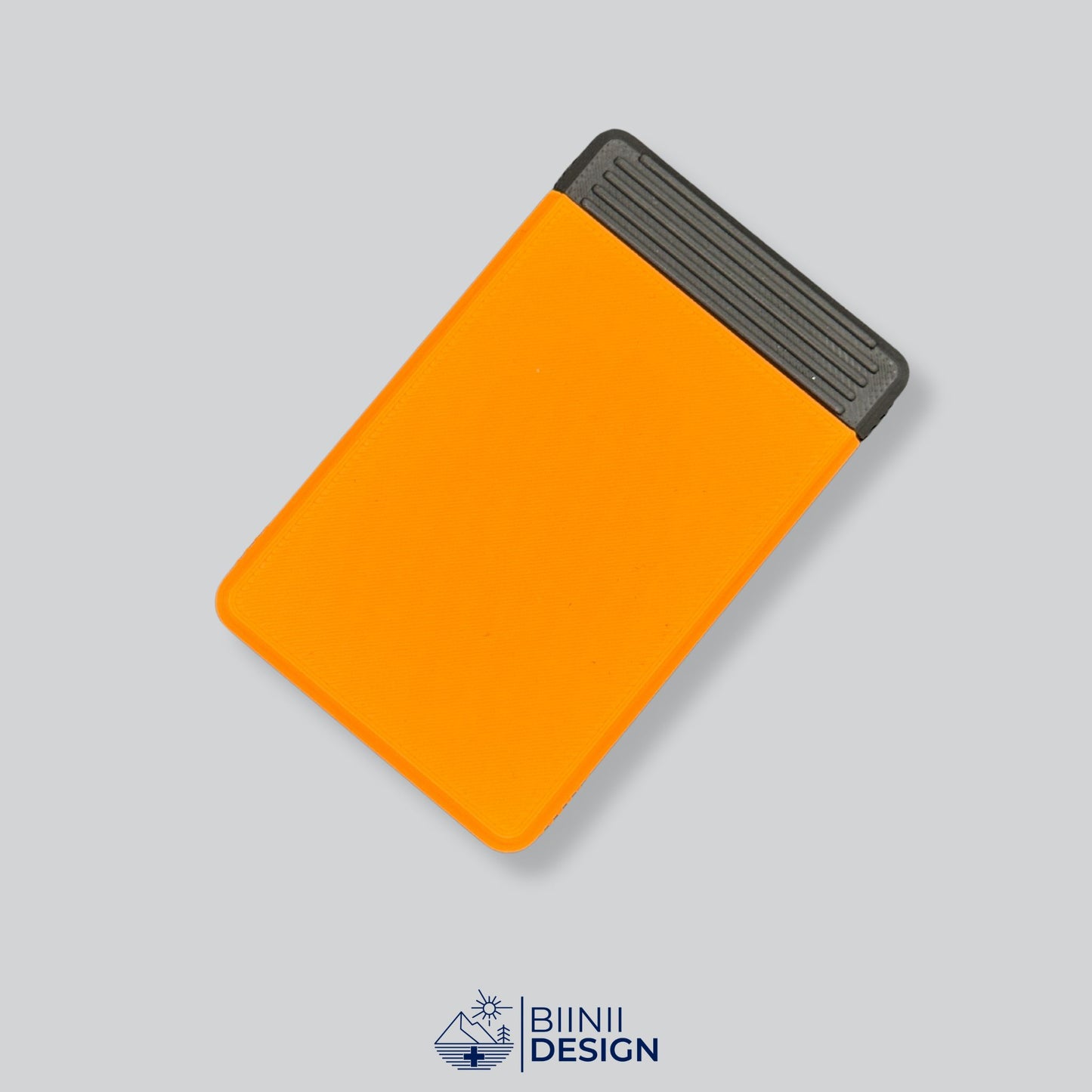 Orange/Black two-tone portable functional supplement case, ideal for supplements and vitamins and presented as a Designed in Switzerland Biinii Design piece.