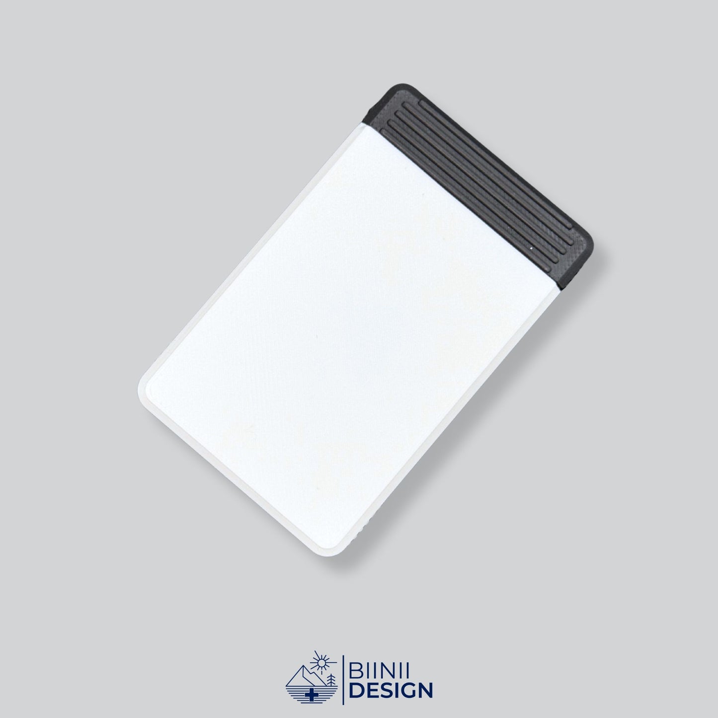 White/Black two-tone 3D printed 4-compartment pill organizer, ideal for multiple doses per day and presented as a Swiss-crafted Biinii Design piece.