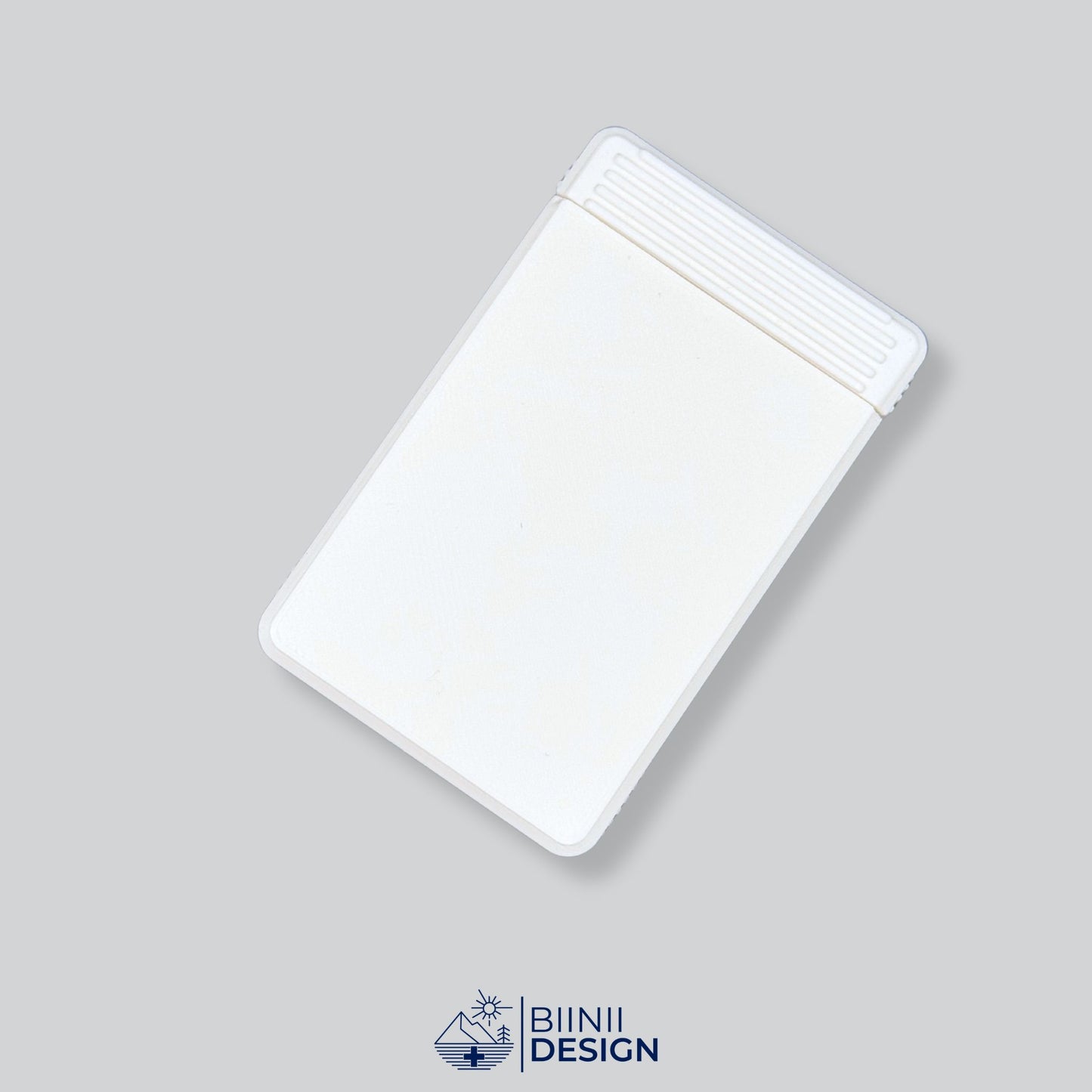 Our compact White monochrome premium pill holder, perfect for prescription pills or over-the-counter meds, a Designed in Switzerland Biinii Design piece.