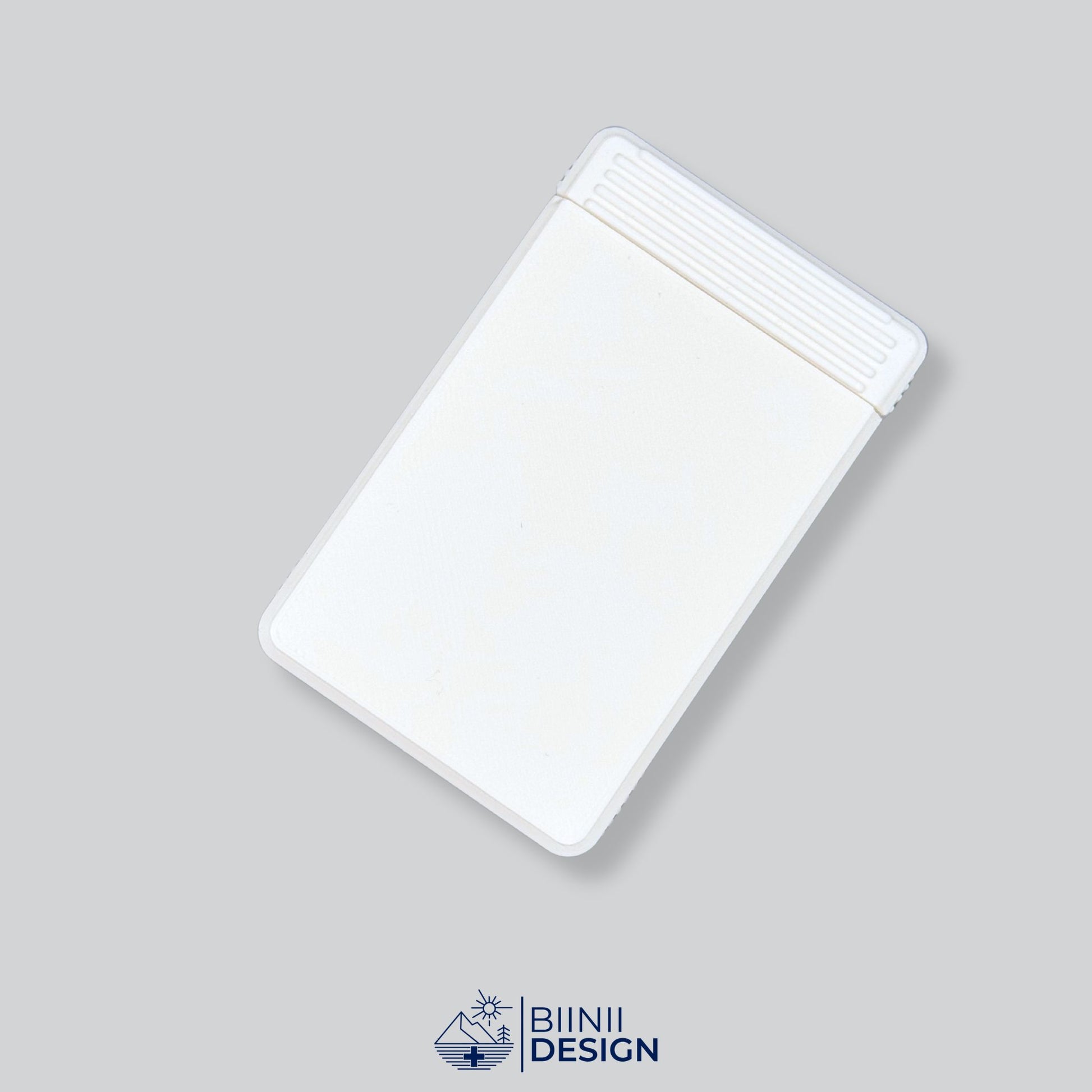 Our compact White monochrome premium pill holder, perfect for prescription pills or over-the-counter meds, a Designed in Switzerland Biinii Design piece.