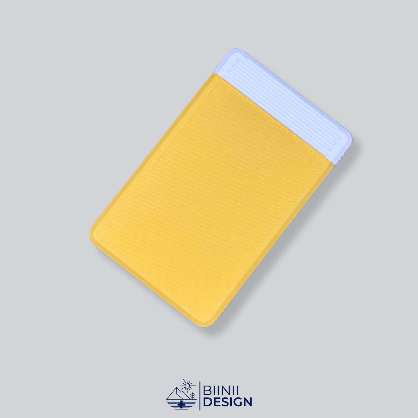 Yellow/White two-tone travel supplement case, ideal for blister-cut tablets and presented as a Designed in Switzerland Biinii Design piece.