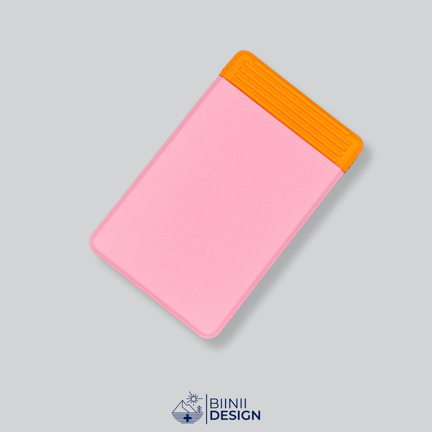 Pink and orange compact weekly pill organizer finish. Swiss-made daily medication box by Biinii Design.
