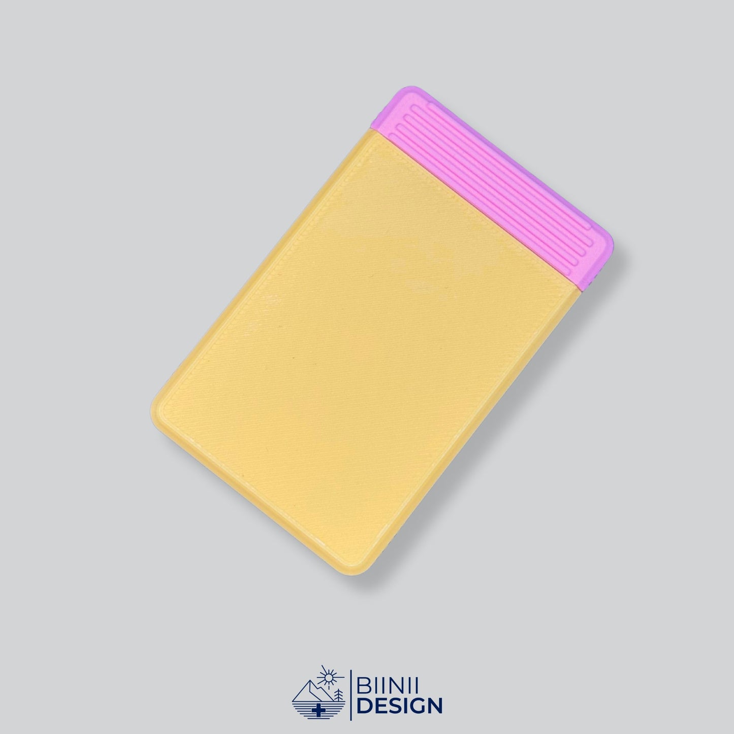 Yellow and pink weekly pill organizer edition. Compact pill case for vitamins, 3D-printed in Switzerland.