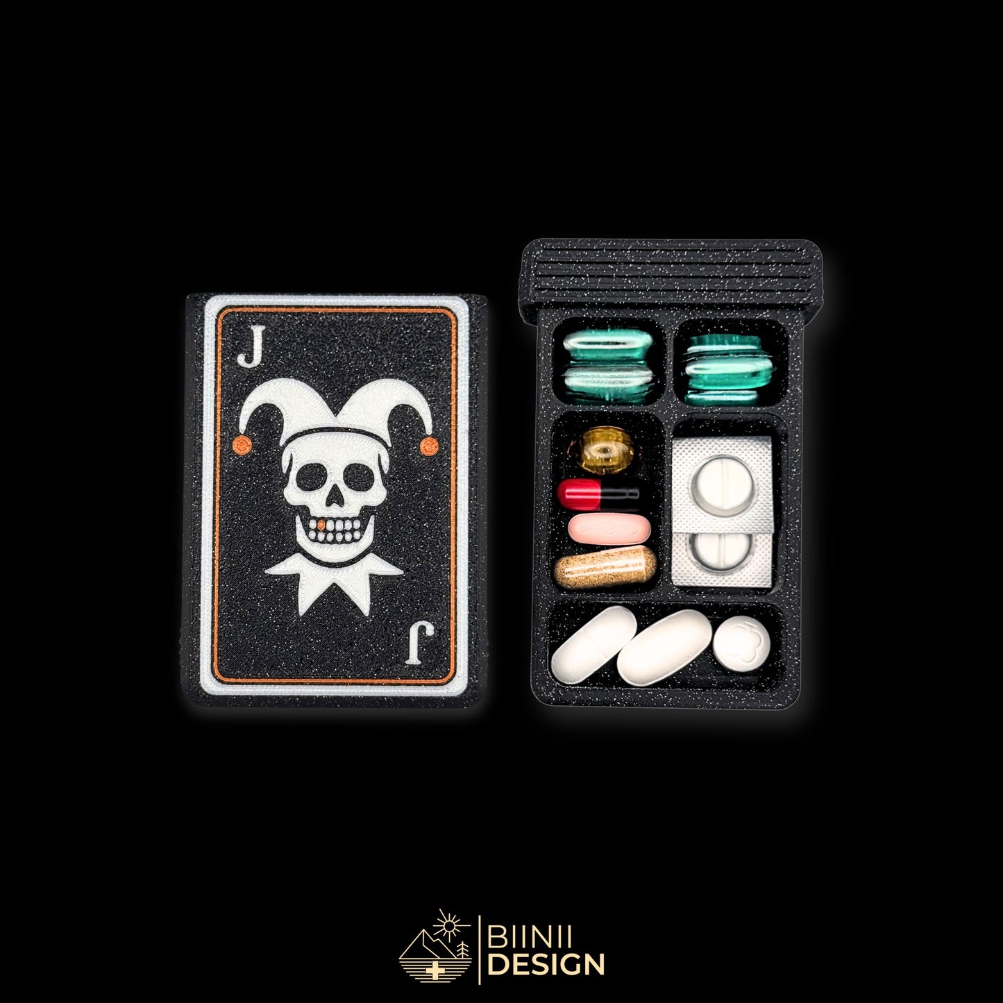 Joker cover next to 5 compartment tray. Filled with capsules. Versatile compact daily pill case.