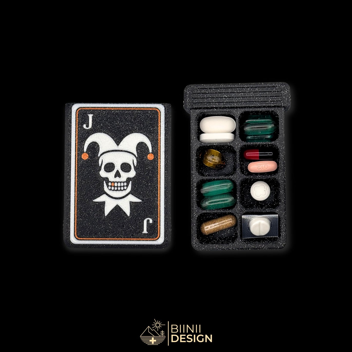 Joker cover beside 8-compartment weekly tray. Filled. Artistic pill organizer for extended medication or supplement plans.