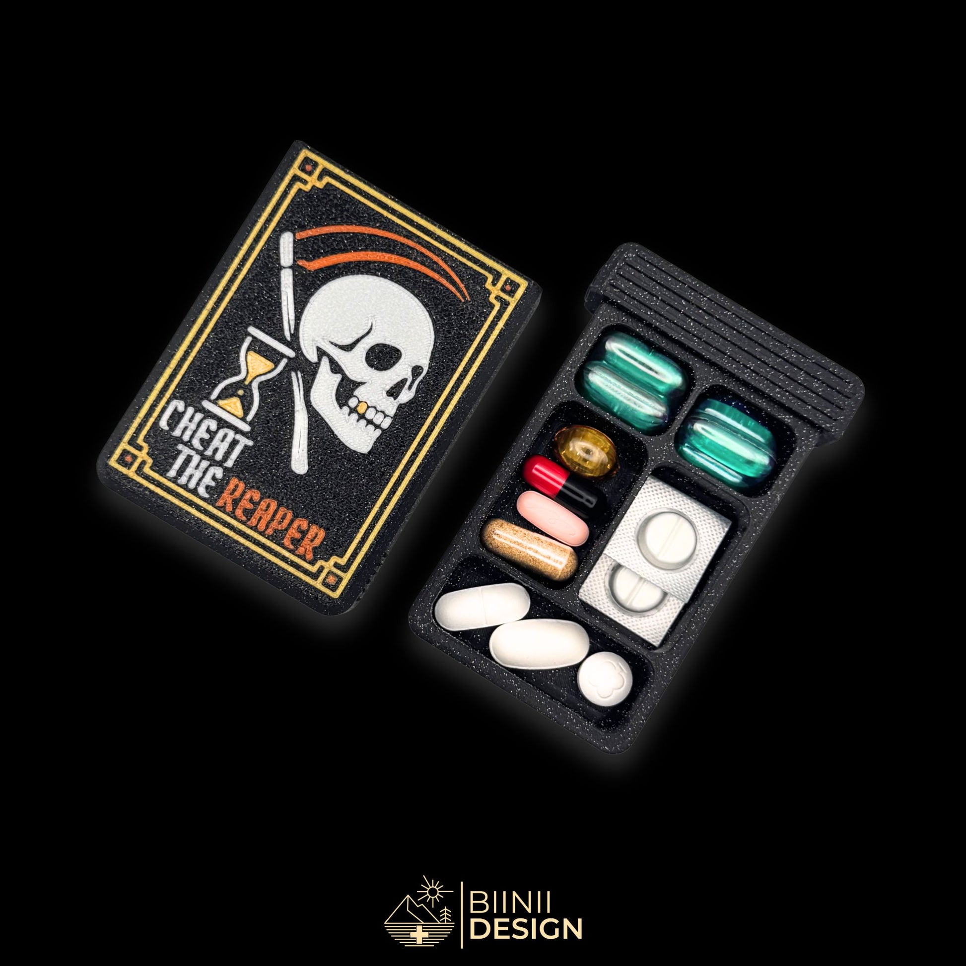 Cheat the Reaper art pill organizer cover beside 5-compartment tray. Secure slide closure filled with liqui-tabs and supplements and blister pills.