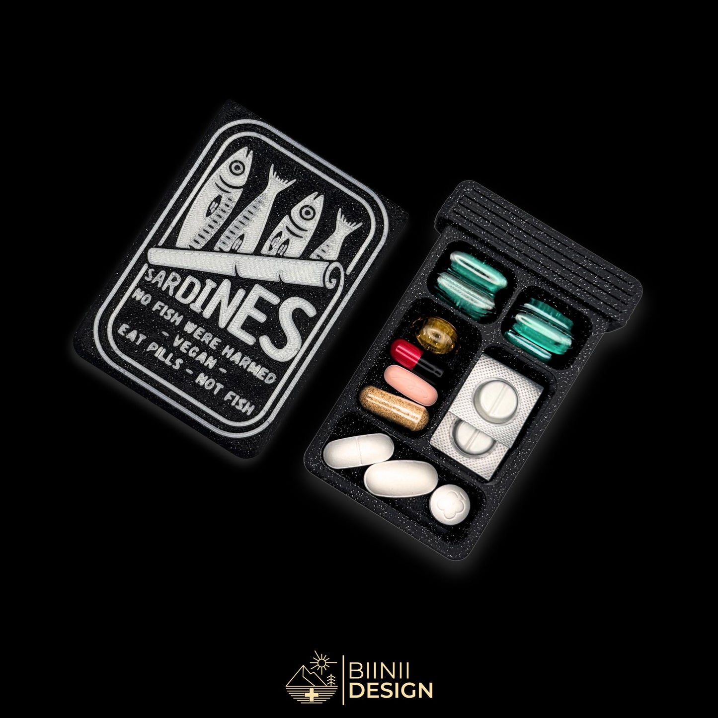 Sardines artistic pill organizer cover beside 5-compartment tray. Secure slide closure filled with vegan supplements and non-fish capsules.
