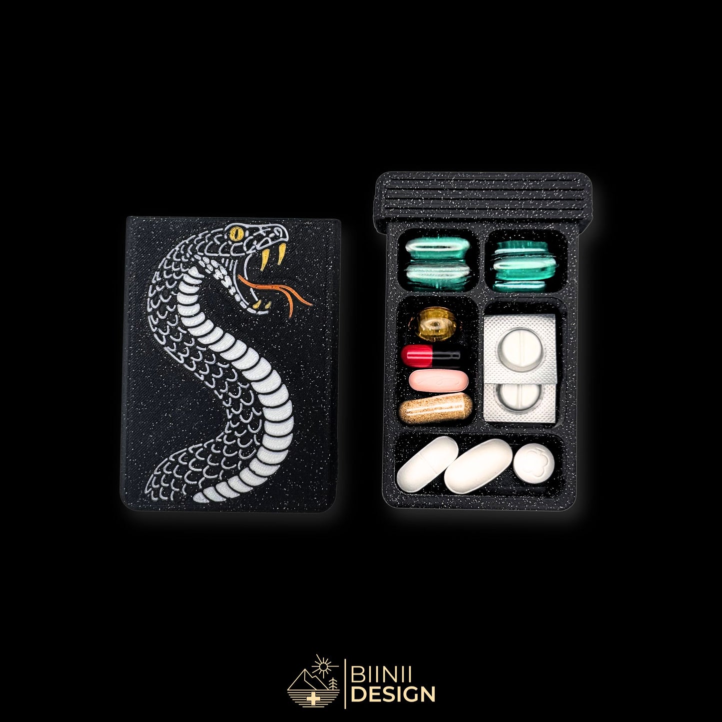 Snake cover next to 5 compartment tray. Filled with capsules. Versatile compact daily pill case.