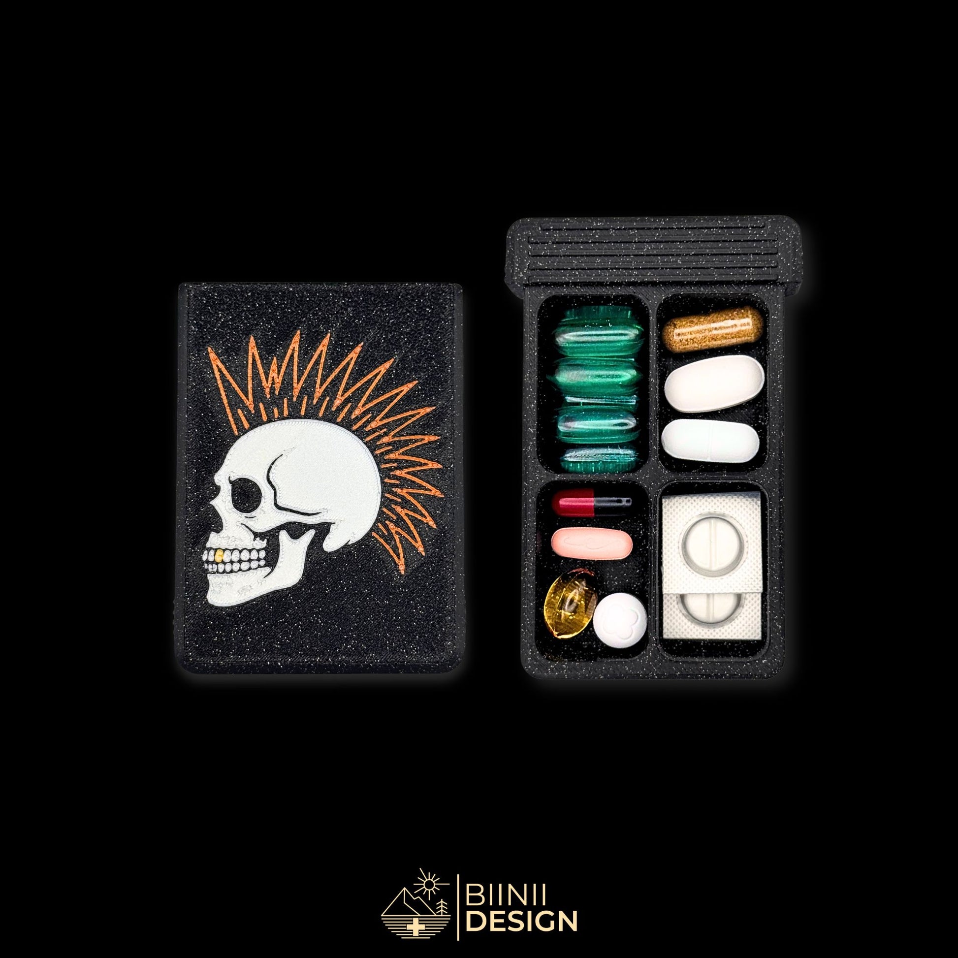 Compact punk pill case with 4 equal compartments and sliding lid — designed for meds, vitamins, or lactaid in a sleek black galaxy finish.