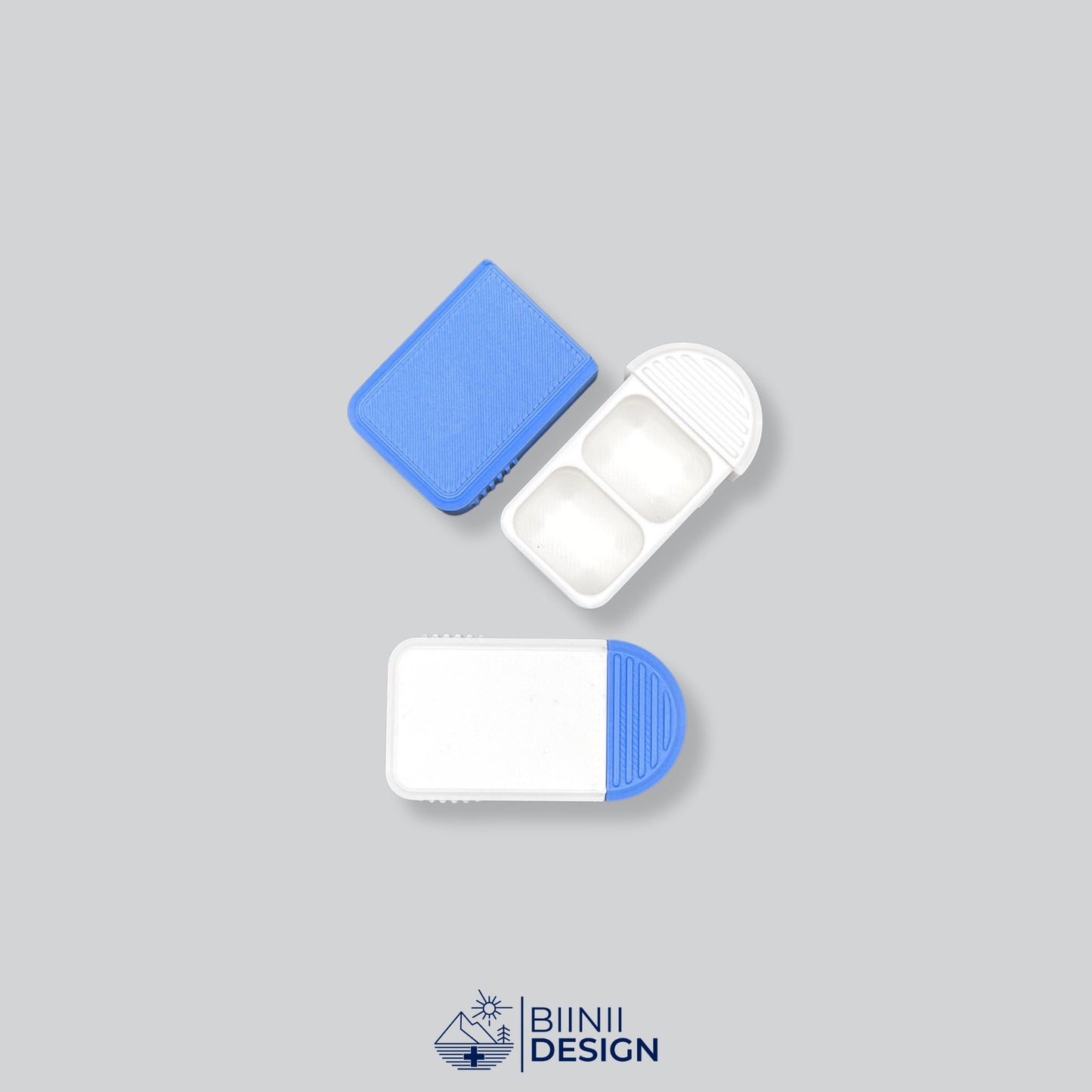 White-and-blue 2-compartment pillbox, Swiss-made compact pill case for vitamins, supplements or medication, modern organizer.
Keywords: pillbox, pill case, pill organizer, pill holder, supplement box