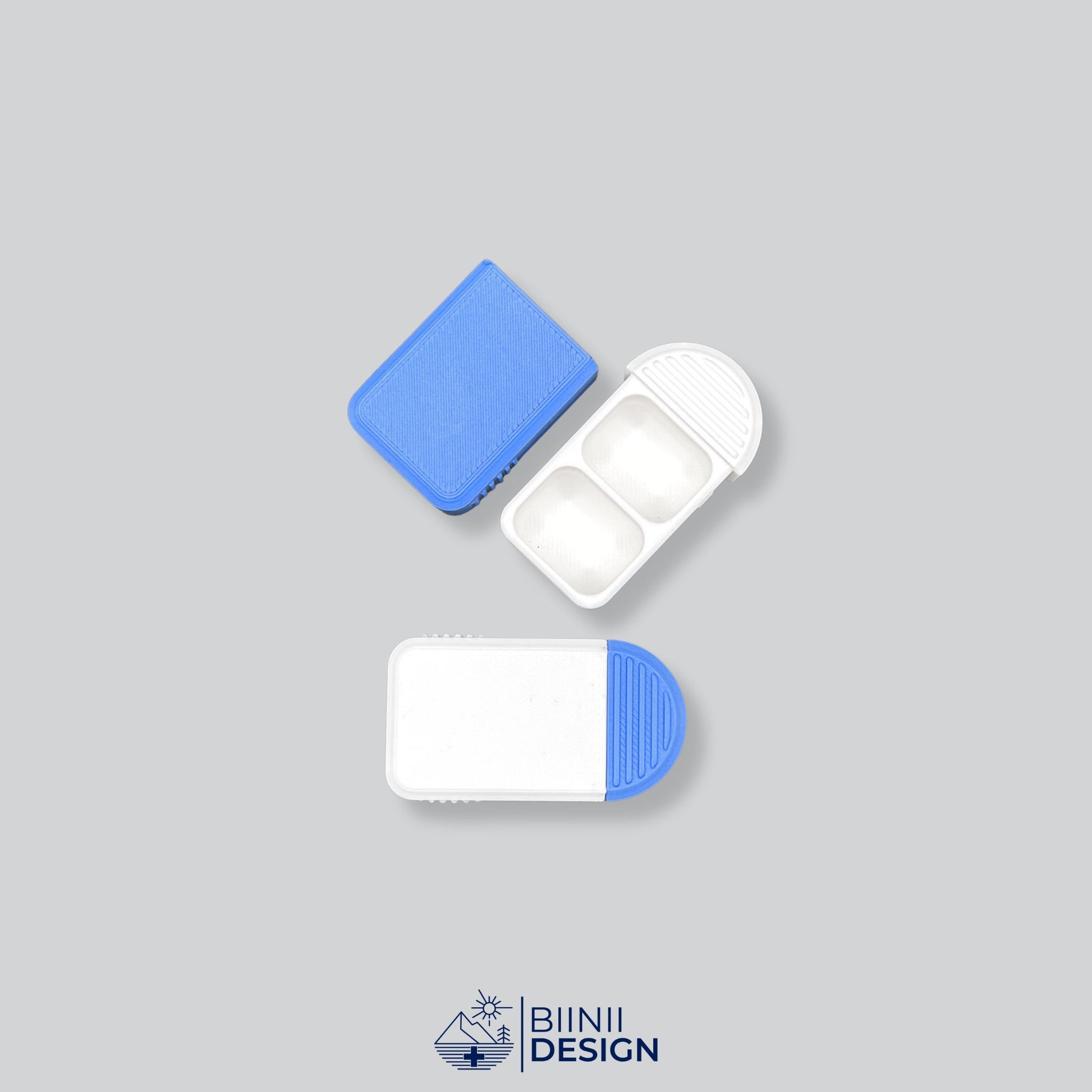 White-and-blue 2-compartment pillbox, Swiss-made compact pill case for vitamins, supplements or medication, modern organizer.
Keywords: pillbox, pill case, pill organizer, pill holder, supplement box