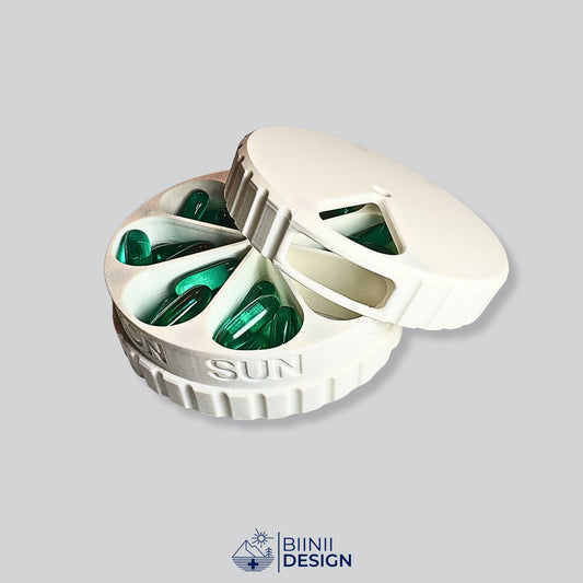 7-day pill box shown partially open with magnetic rotating lid — each day clearly labeled, perfect for daily meds or travel use.
Keywords: 7 day pill organizer, magnetic pill case, daily medication box, compact weekly pill box