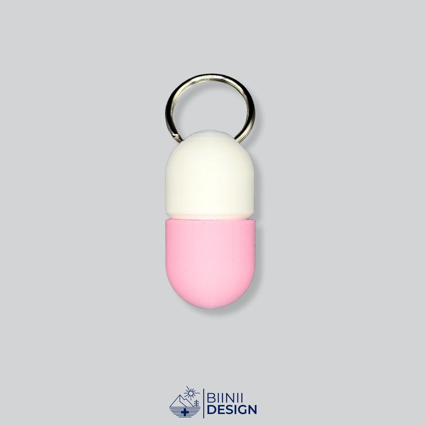 White and pink travel pillbox with screw-lock top. A soft-toned, elegant capsule holder for on-the-go supplements or meds.
Keywords: stylish pill container, travel supplement case, pink pillbox