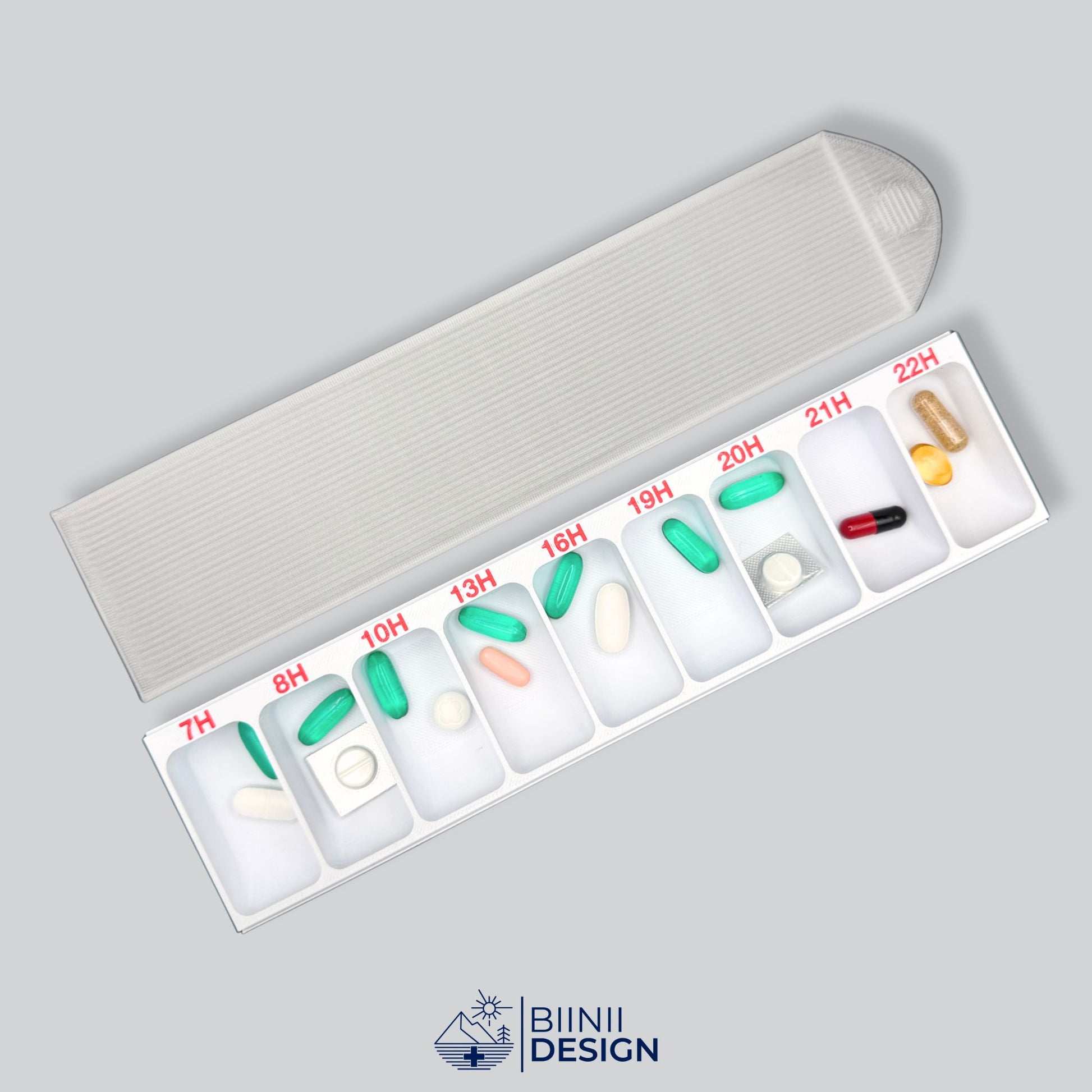 Hourly pill organizer with translucent lid, Swiss-made for daily medication schedule, compact and customizable.
Keywords: pill organizer, pillbox, hourly pill organizer, compact