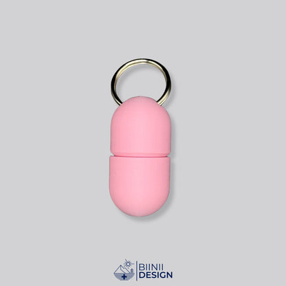 Ganz rosafarbene Compact-Pillendose für den Schlüsselanhänger, eine von 49 ein- und zweifarbigen Kombinationen.