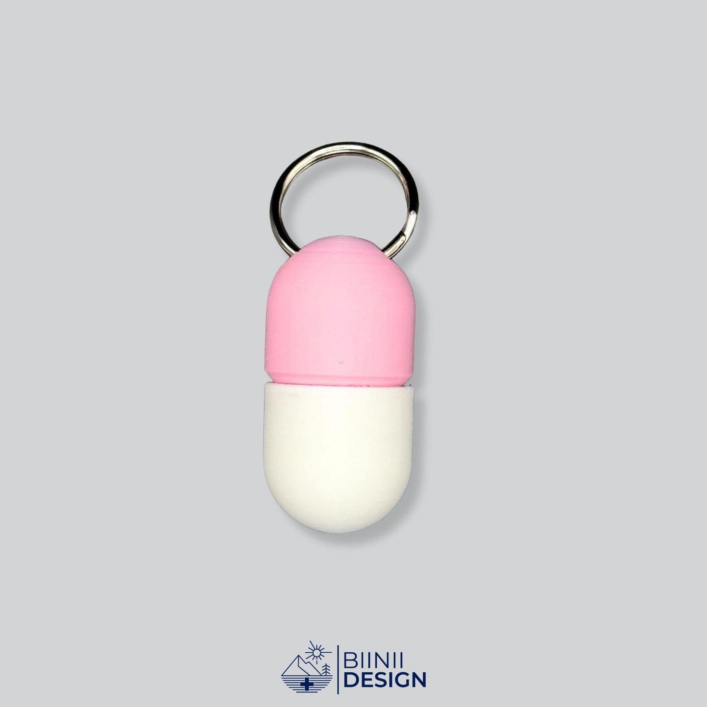 Two-Tone Pink/White Keychain Pill Case (Compact). Perfect for daily medication doses, 49 unique color options available.