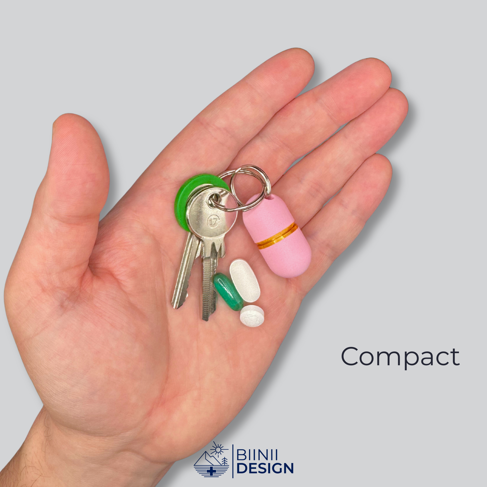 Pink deluxe compact pillbox held in hand next to keys and tablets. Discreet, portable, ideal for everyday carry or urgent meds.
Keywords: compact pill organizer, EDC pill holder, emergency pill case, daily supplement box, mini pill container