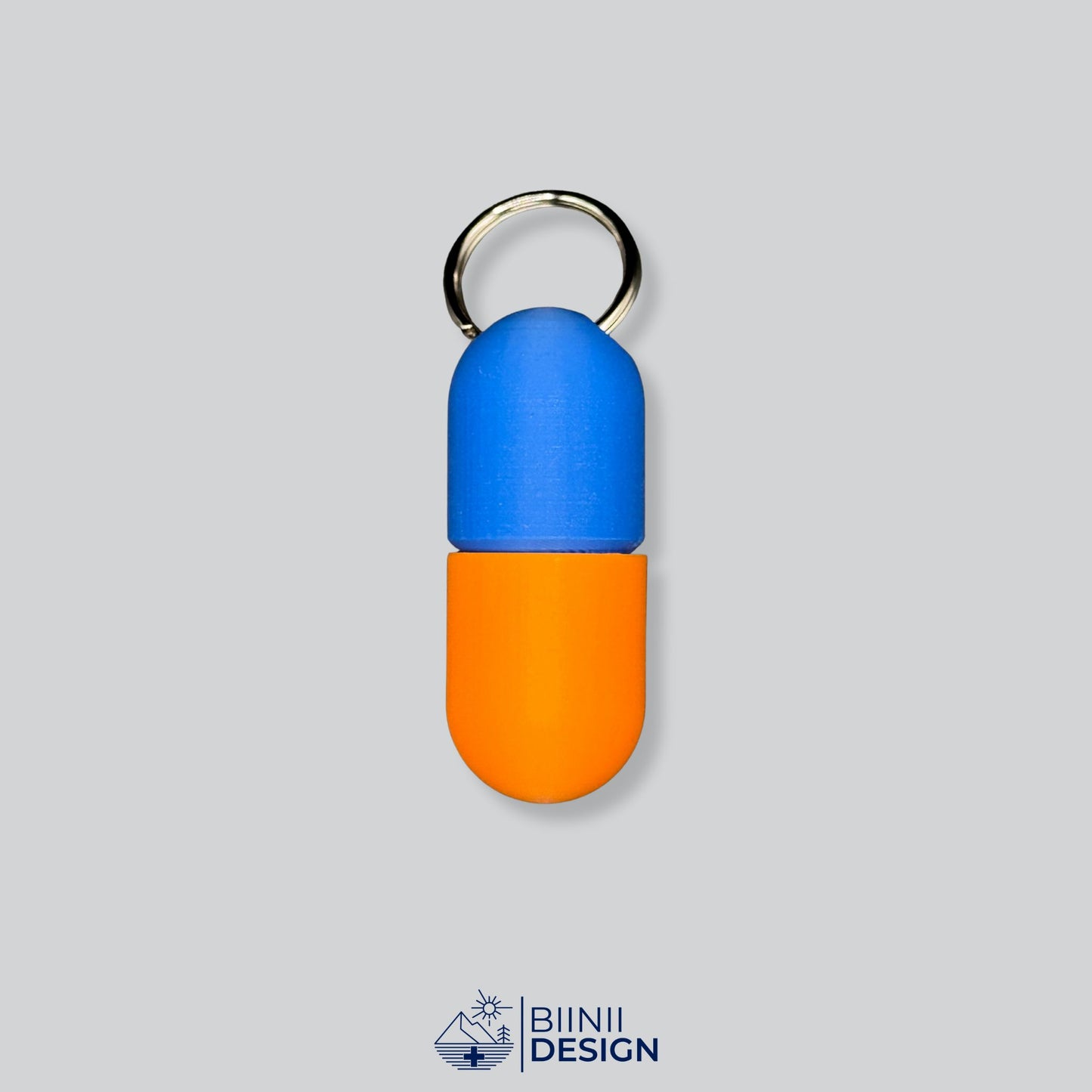 Blue/Orange pillbox with fun duo-tone. A portable solution for daily supplements or allergy relief.
Keywords: pill container, travel companion, daily pill box