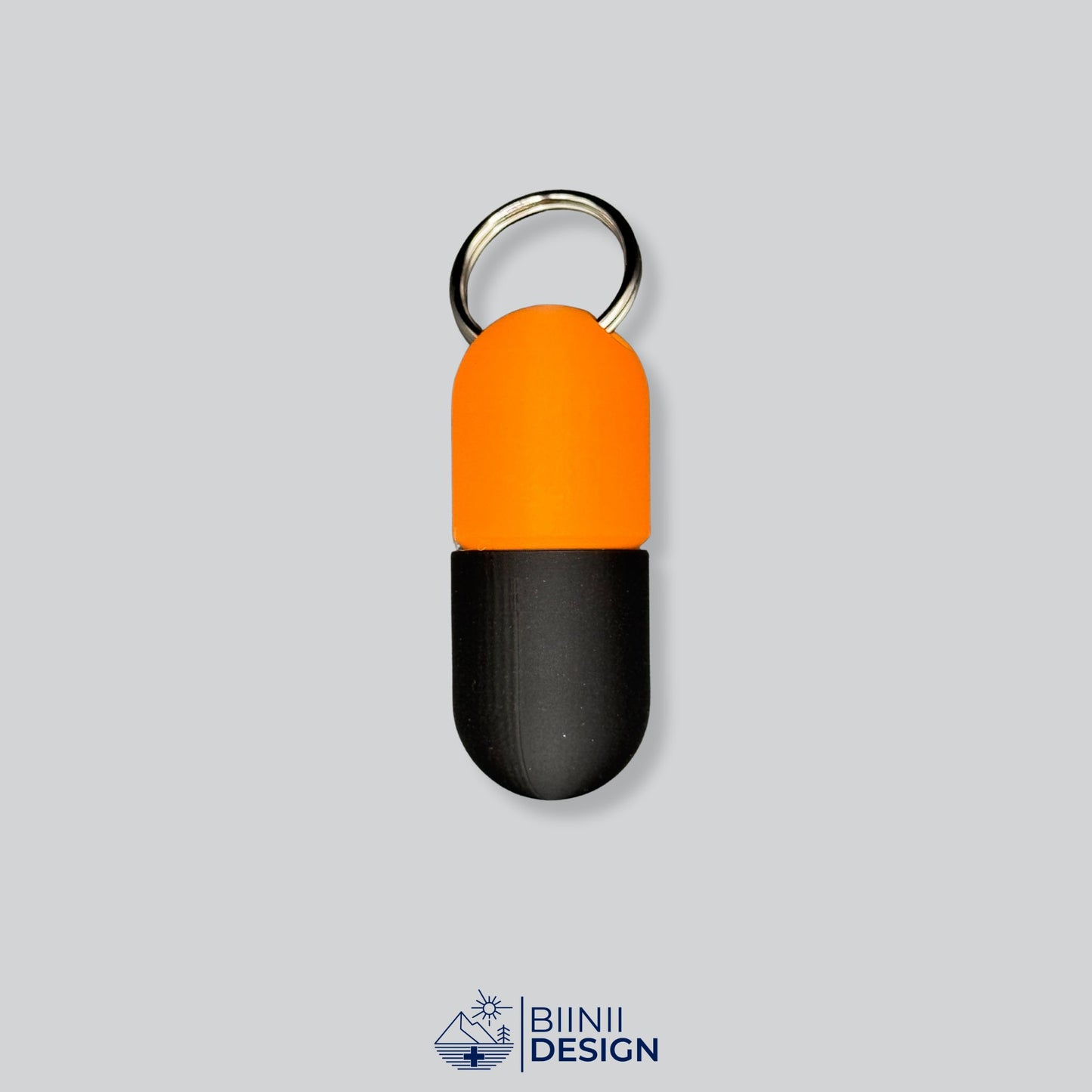 Orange/Black pill case with strong contrast and functional closure. Fits neatly on your keyring.
Keywords: keyring pillbox, screw-top pill container, travel organizer