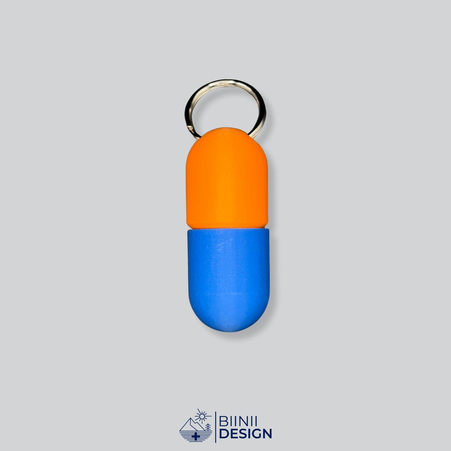 Orange/Blue pill case with energetic duo-tone colors. Swiss-made, lightweight and secure.
Keywords: travel pill container, keychain pill holder, large pillbox