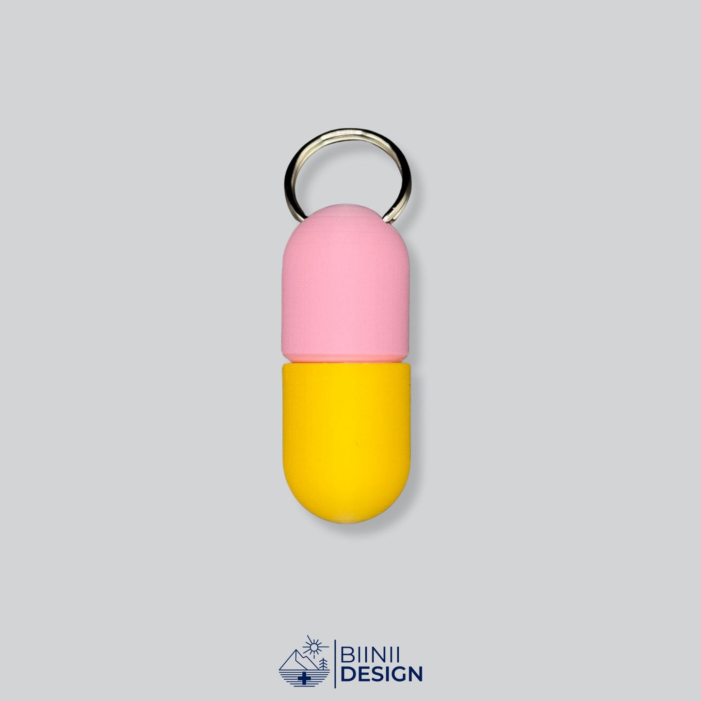 Pink/Yellow capsule box with joyful tones. A playful way to carry pills.
Keywords: travel pill case, daily pill container, customizable pillbox