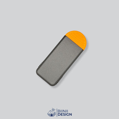 Compact 3-compartment pill box with a black lid and an orange base, for pills taken 3 times a day.