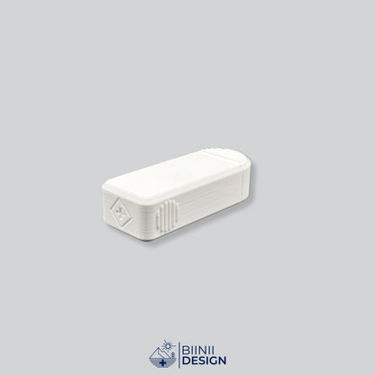 Rear view of the closed white compact 3-compartment pill box, Biinii logo visible, the sliding lid shut over the base.