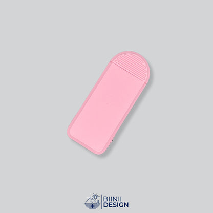 All-pink compact 3-compartment pill box, one of 49 lid and base color combinations.