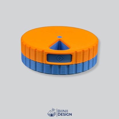 Round magnetic 7-day pill organizer with an orange lid and a blue base, Sunday or Monday start.