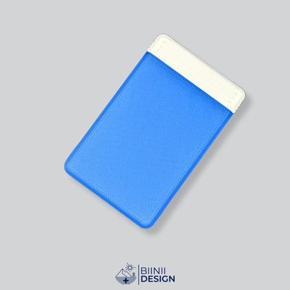 Double-row travel pill box with a blue lid and a white base, eight compartments for the days away.