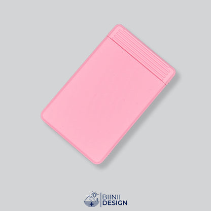 All-pink double-row travel pill box, one of 49 lid and base color combinations.