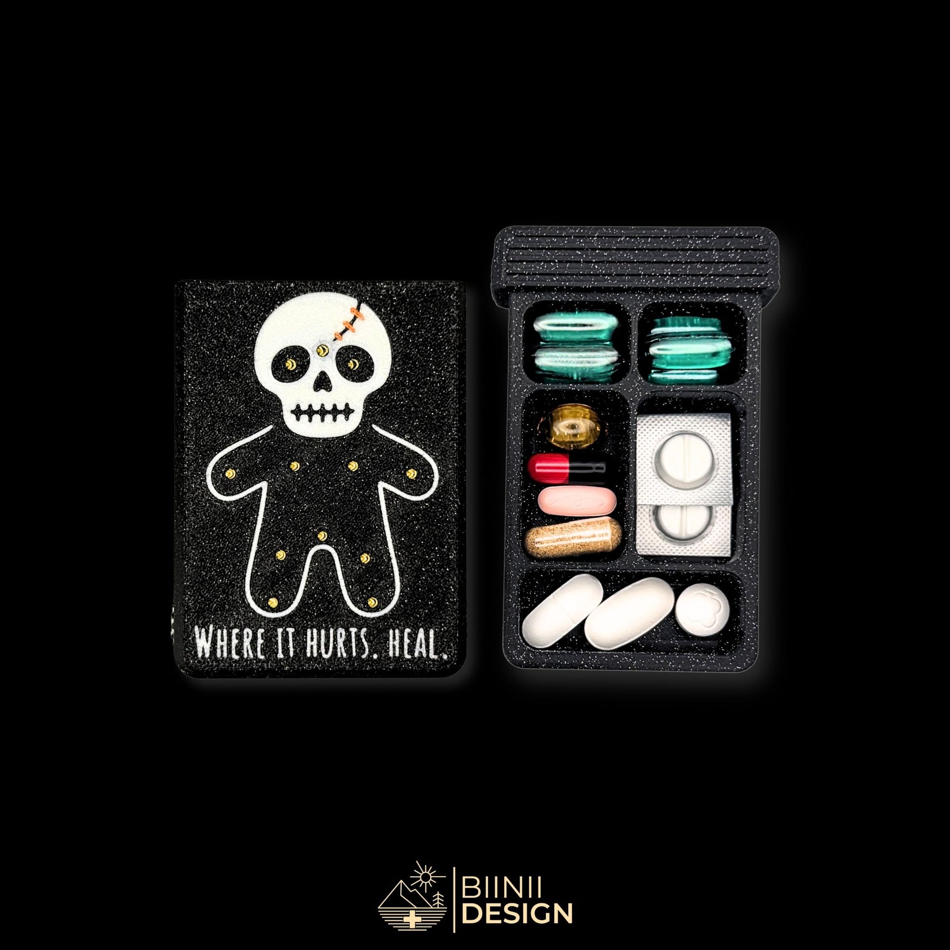 Healing Voodoo cover next to 5 compartment tray. Filled with capsules. Versatile compact daily pill case.