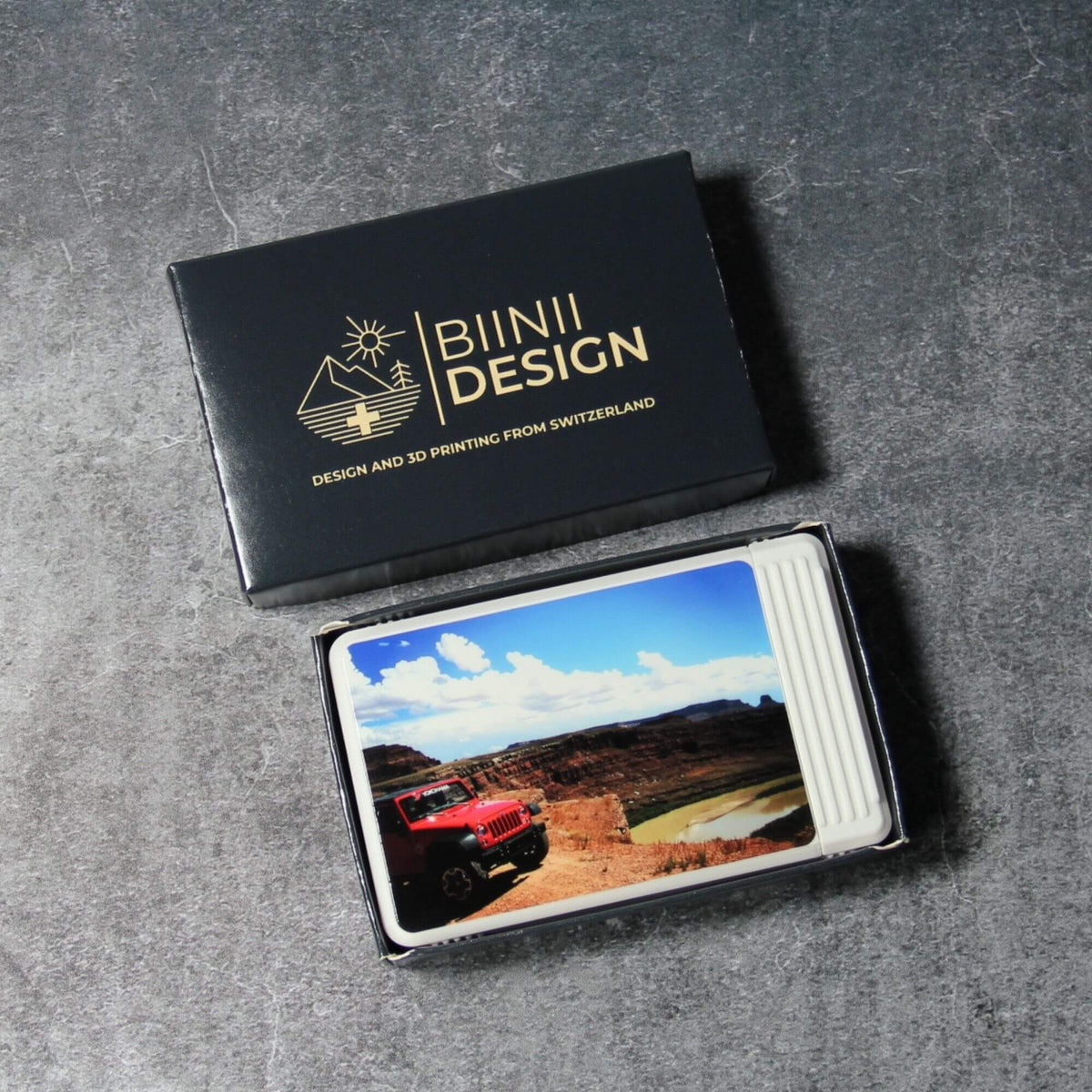 Custom photo pill organizer, white, in its navy Biinii gift box with the gold logo, ready to gift