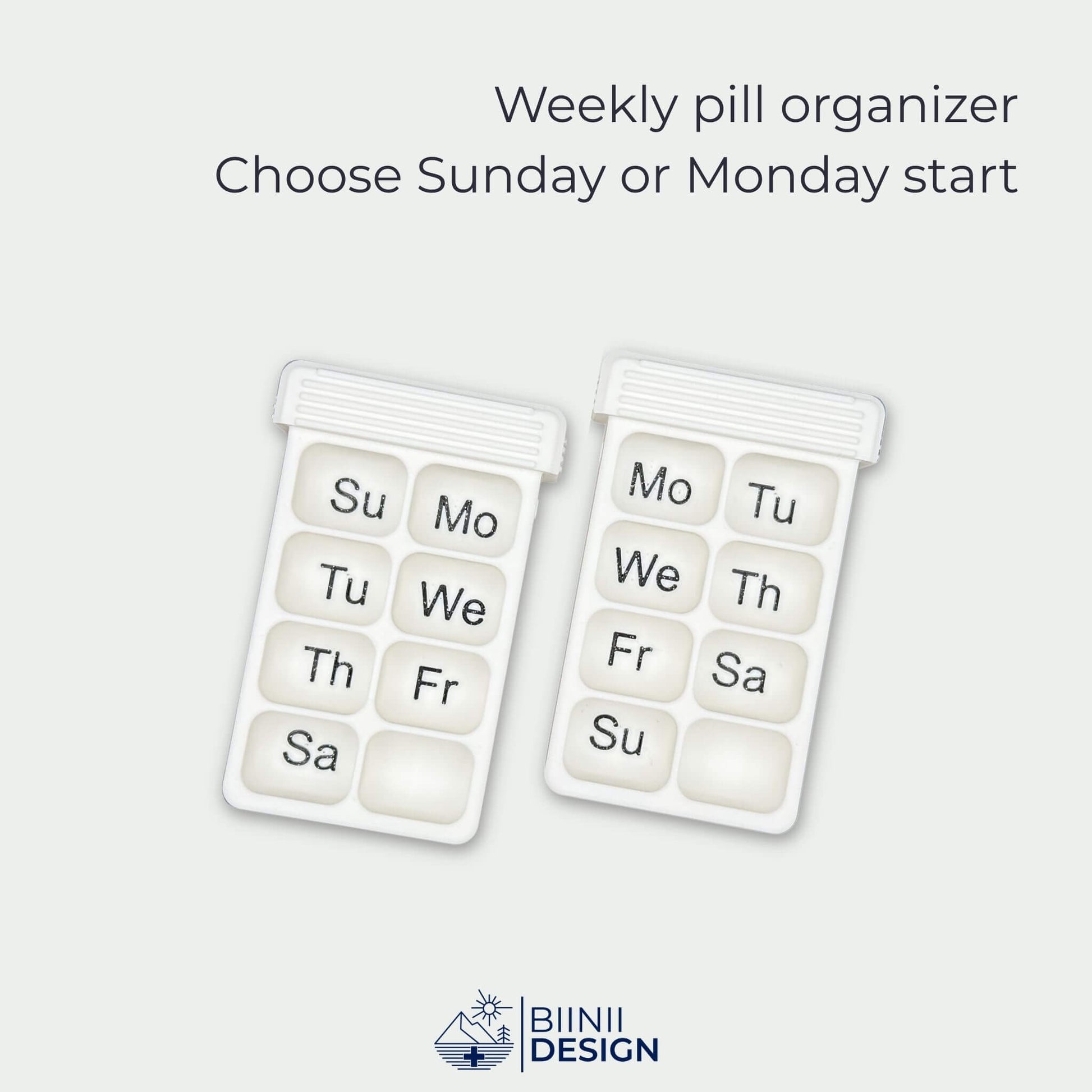 Empty white 8-compartment weekly pill organizer tray with black English Sunday and Monday day engraving.