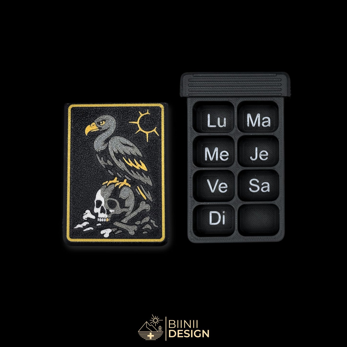 Vulture Shadow cover next to empty 8 compartment tray (FR days). Weekly artistic pill organizer option for French market.