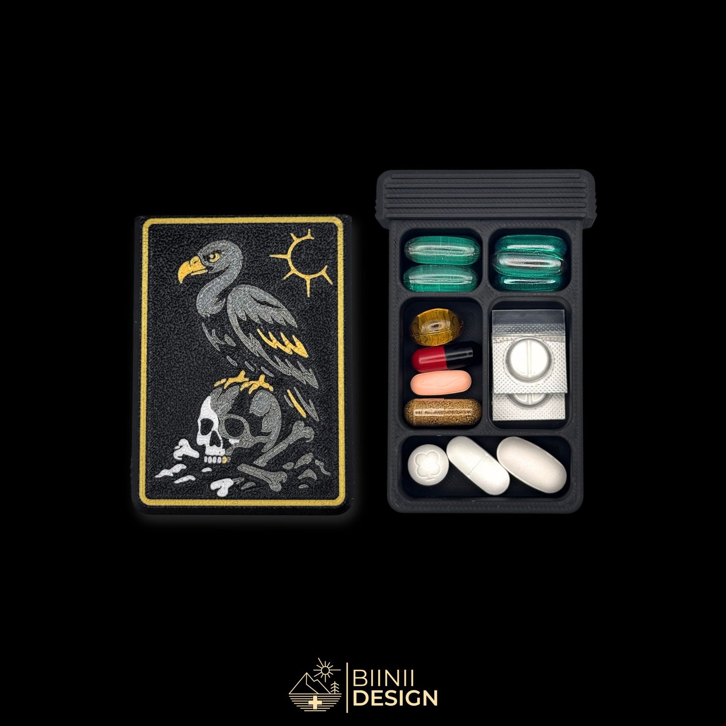 Vulture Shadow cover next to 5 compartment tray. Filled with capsules. Versatile compact daily pill case.