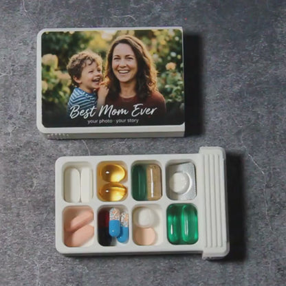 Demo video: the custom photo pill organizer opens with eight compartments filled, closes with a click, and slides into its Biinii gift box.
