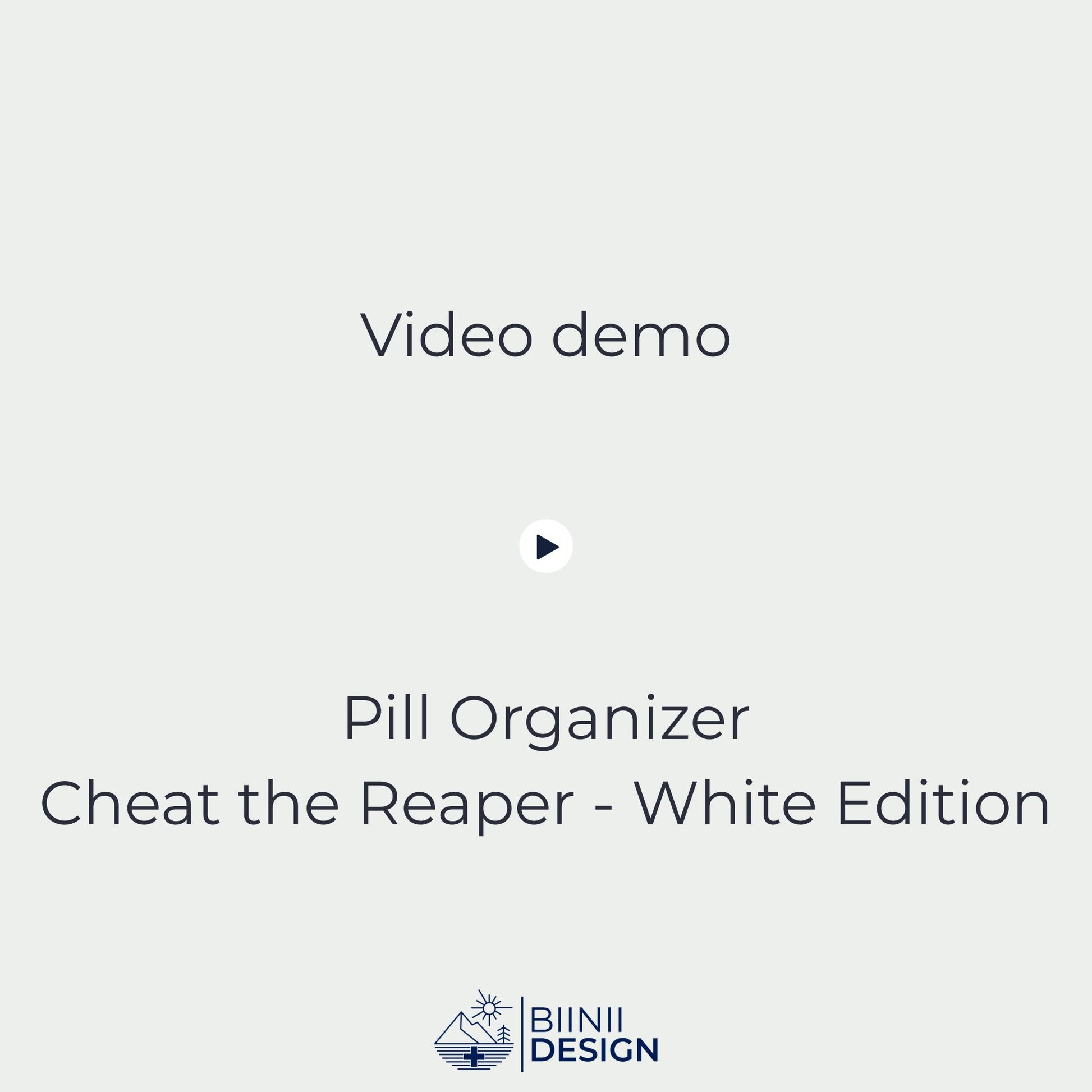 Video demonstration of the Cheat the Reaper White Edition sliding pill organizer opening and closing (5-compartment filled), then placed into its premium Swiss-made Biinii gift packaging.