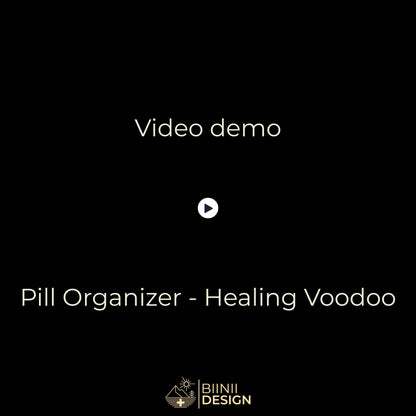 Demo video: the Healing Voodoo sliding pill organizer opens with five compartments filled, closes, and sits in its Biinii gift box.