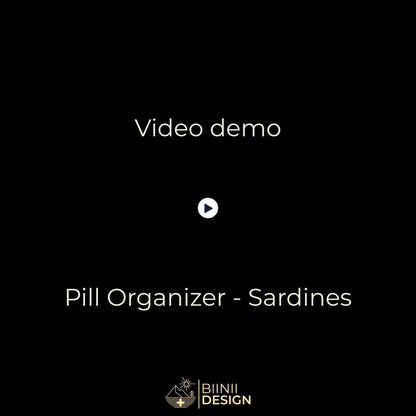 Demo video: the Sardines sliding pill organizer opens with five of its compartments filled.